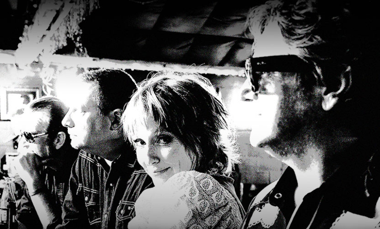 Black-and-white promotional photo of American pop-rock band Sixpence None The Richer, featuring singer Leigh Nash looking at the camera.
